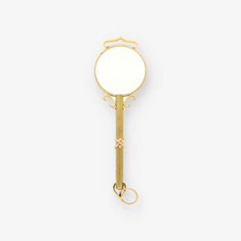 Colgante lupa oro y bri