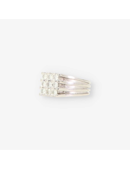 Anillo oro blanco y 9 bri
