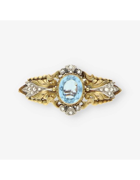 Broche oro topacio azul y diamantes