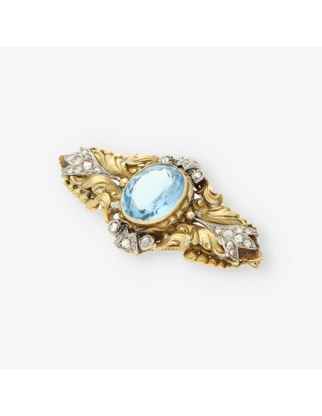 Broche oro topacio azul y diamantes