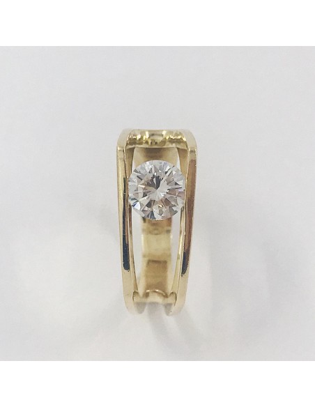 Anillo en oro de 18kt. con doble banda y brillante