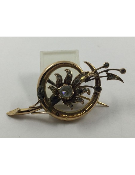 Broche de oro rosa con diamantes