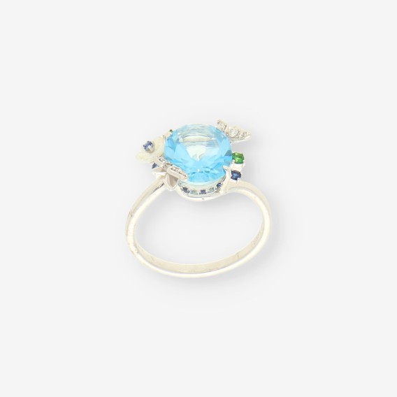 Anillo oro bl. brillantes y topacio azul