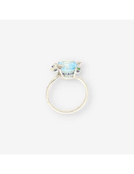 Anillo oro bl. brillantes y topacio azul