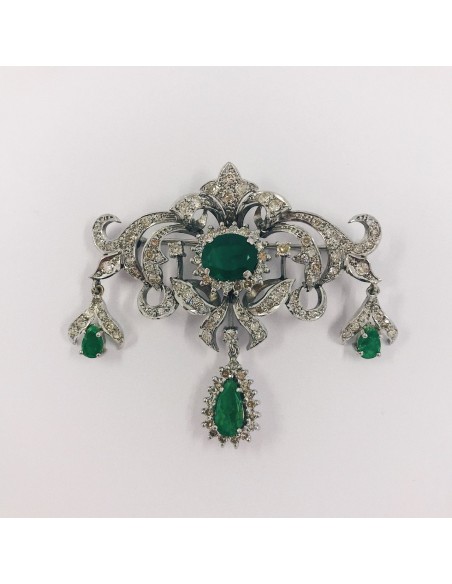 Broche en oro blanco 18kt brillante y esmeralda