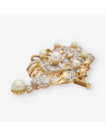 Broche de oro con diamantes y perlas
