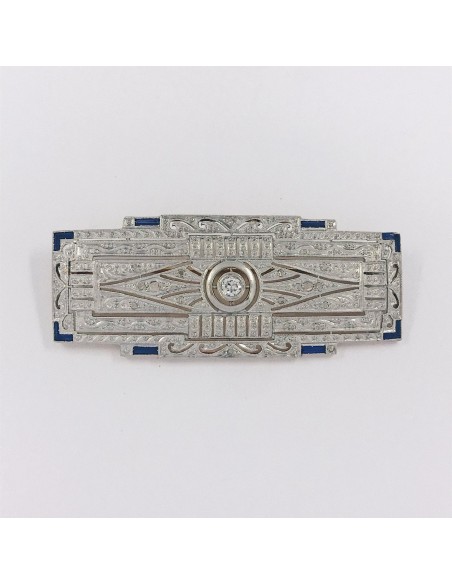 Broche Art Deco en oro blanco 18kt y brillantes.