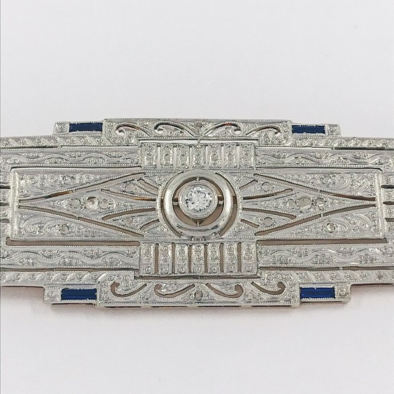 Broche Art Deco en oro blanco 18kt y brillantes.