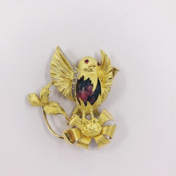 Broche en forma Canario en oro 18kt y diamantes