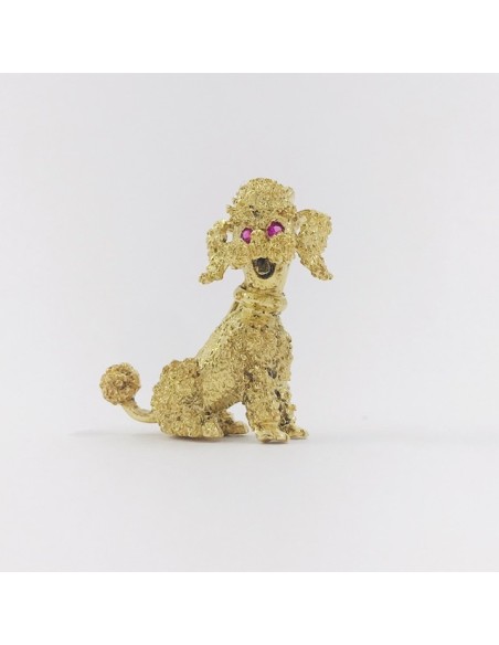 Broche forma de perro en oro 18kt