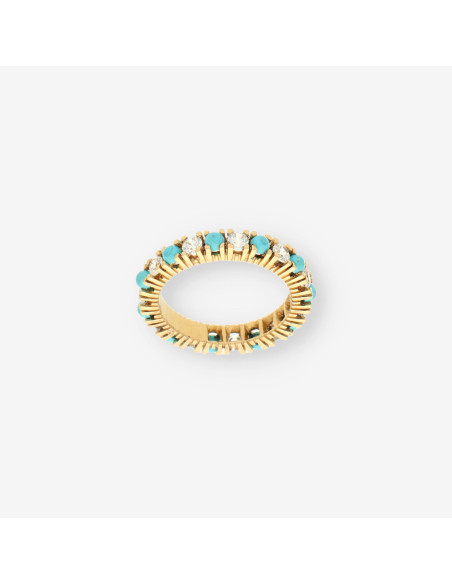 Alianza oro coral y circonitas