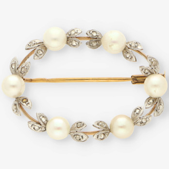 Broche oro blanco perla y diamante