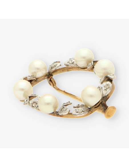 Broche oro blanco perla y diamante