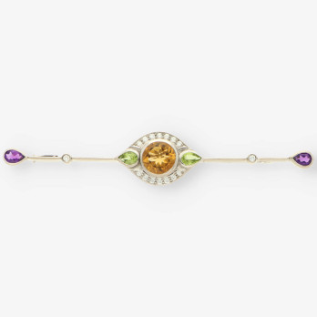 Aguja oro blanco bri y piedra color