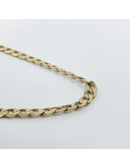 Cadena barbada plana en oro 18kt