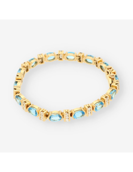 Pulsera p. azul oro y brillantes