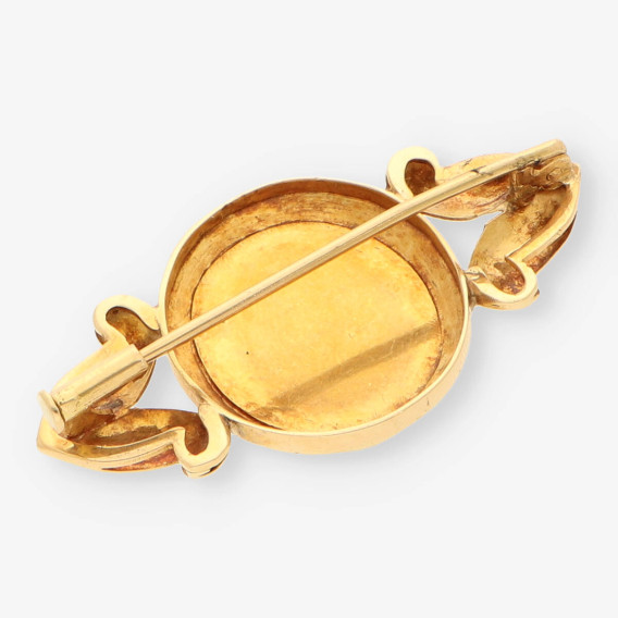Broche oro y piedra verde