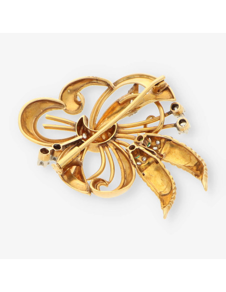 Broche oro esmeralda y bri