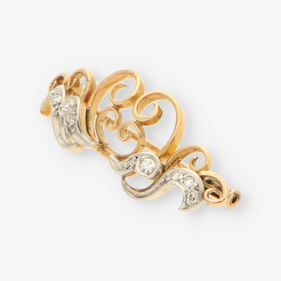 Aguja oro y diamantes