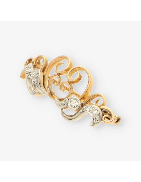 Aguja oro y diamantes