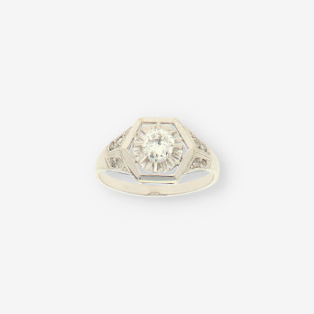 Anillo oro blanco y bri aprox. 0.50 Qt.