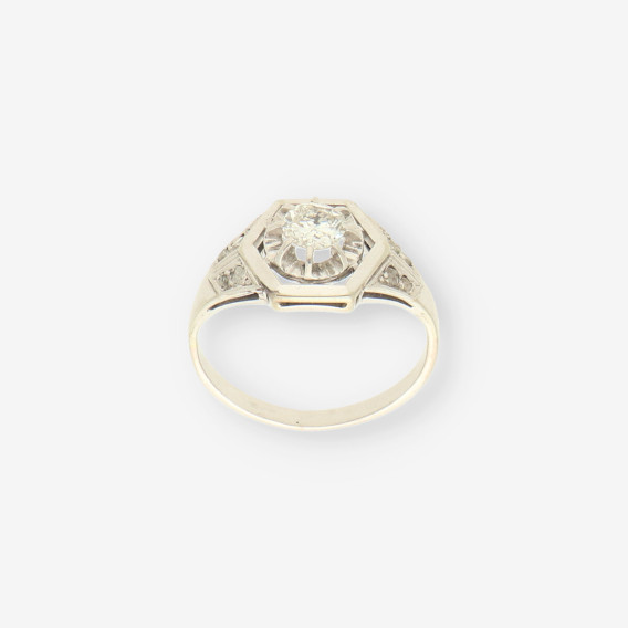 Anillo oro blanco y bri aprox. 0.50 Qt.