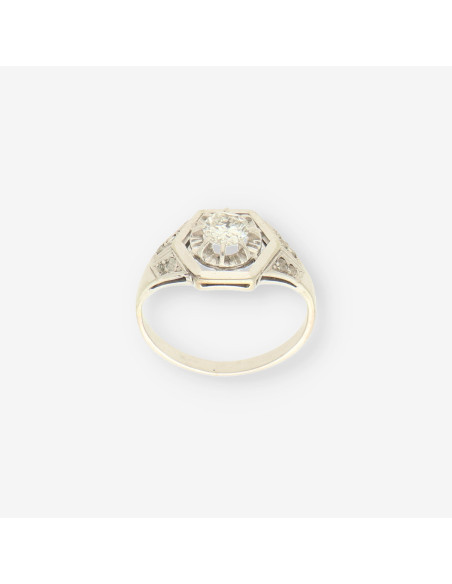 Anillo oro blanco y bri aprox. 0.50 Qt.