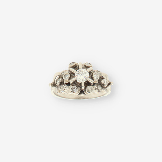 Anillo oro blanco y bri
