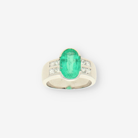 Anillo oro bl. Esmeralda y brillantes