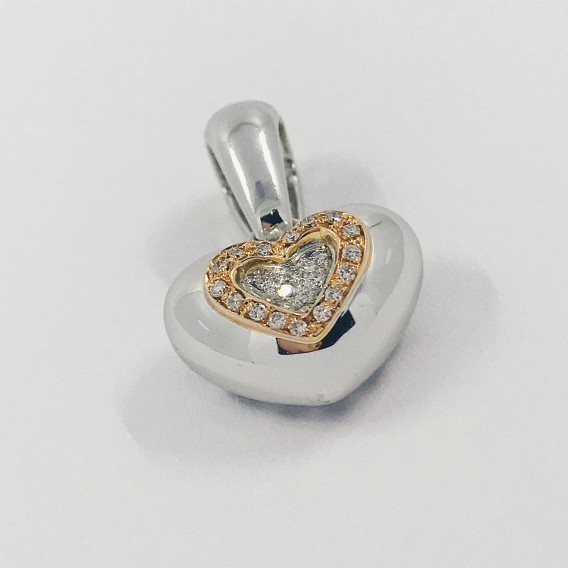 Colgante Chimento corazÃ³n en oro blanco con brillantes.