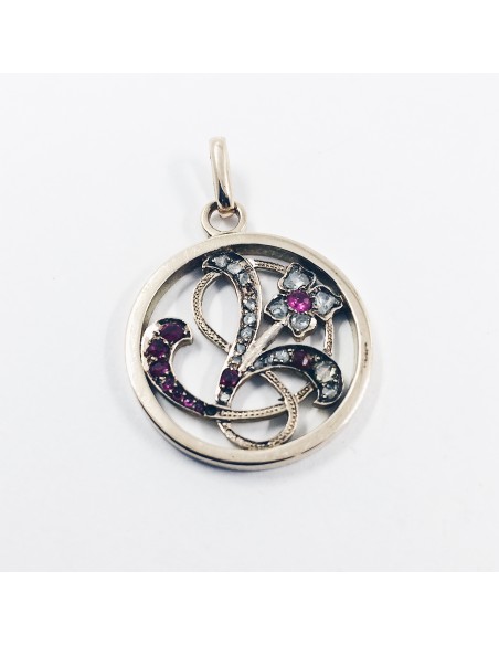 Colgante de oro con diamantes y rubÃ­es