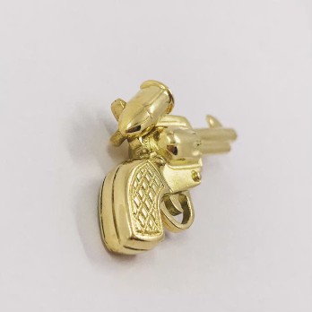 Colgante revÃ³lver en oro 18kt 2