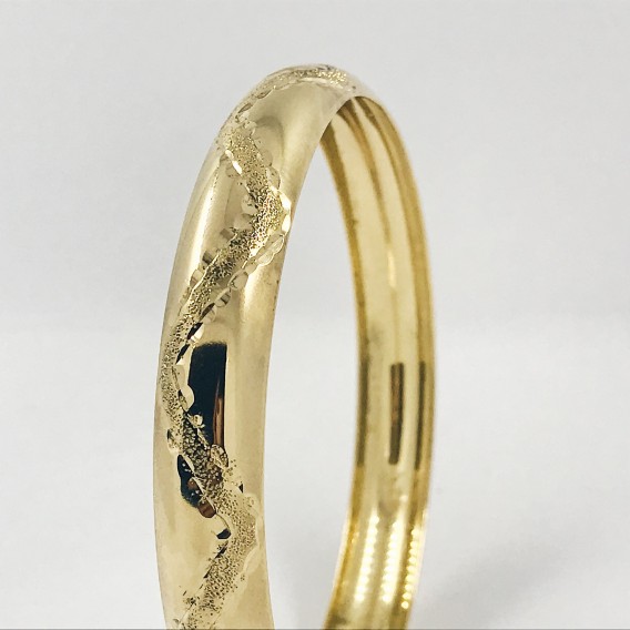 Esclava circular en oro 18kt.