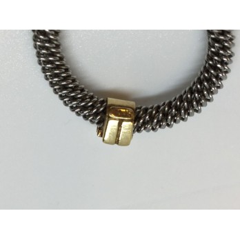 Sortija Tous en acero y oro amarillo y figura niÃ±a 2