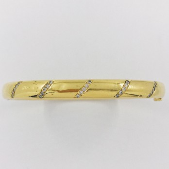 Pulsera esclava en oro 18kt. con brillantes.