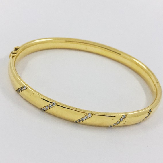 Pulsera esclava en oro 18kt. con brillantes.