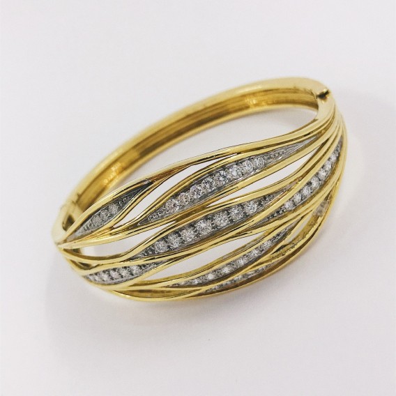 Pulsera esclava en oro y brillantes
