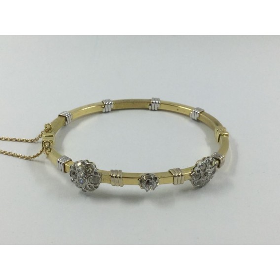 Pulsera esclava en oro y flores con brillantes