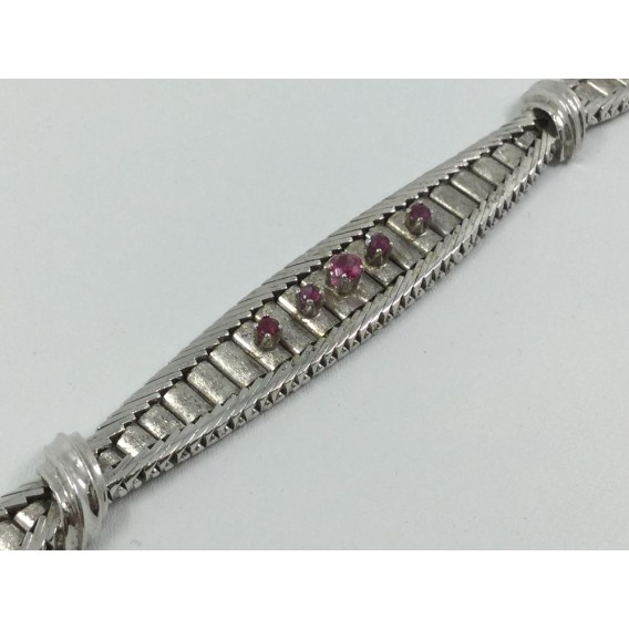 Pulsera en oro blanco mate y brillo con piedras de color.