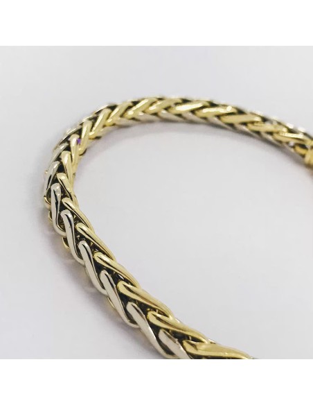 Pulsera trenzada en oro bicolor de 18kt