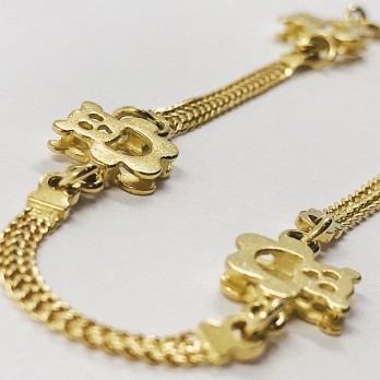 Pulsera con ositos en oro 18kt. 2