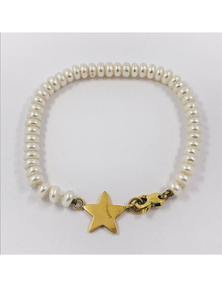 Pulsera de perlas con estrella en oro 18kt.