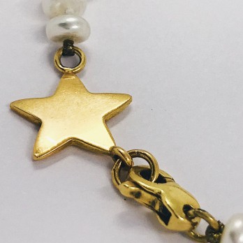 Pulsera de perlas con estrella en oro 18kt. 2