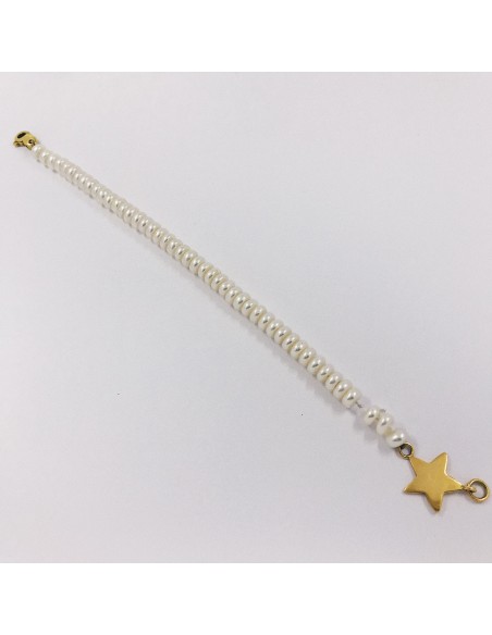 Pulsera de perlas con estrella en oro 18kt.