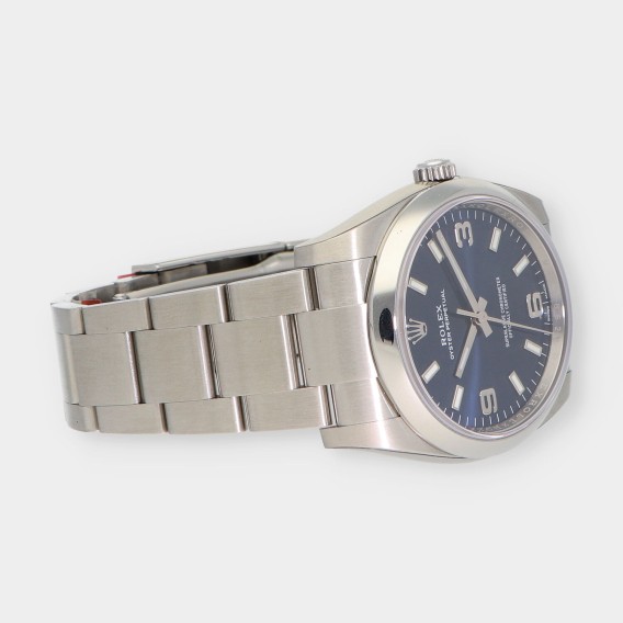 Rolex Oyster Perpetual 114200 caja y documentos