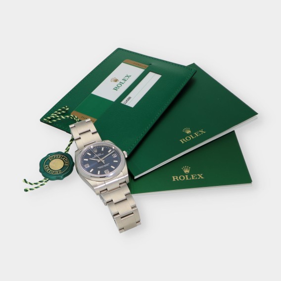 Rolex Oyster Perpetual 114200 caja y documentos