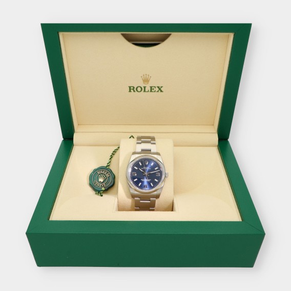 Rolex Oyster Perpetual 114200 caja y documentos