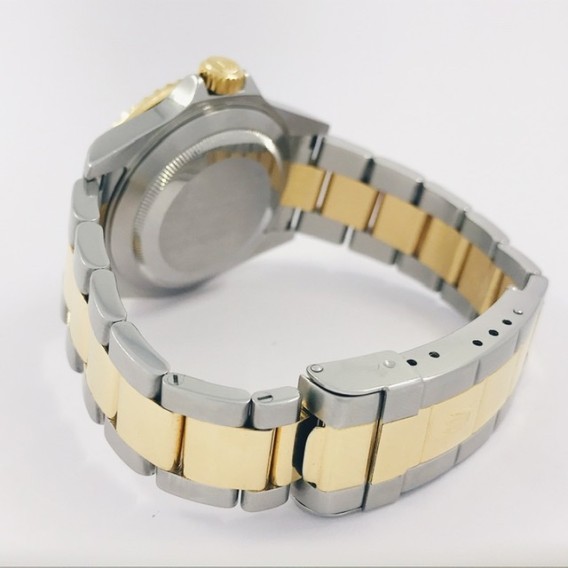 Rolex Submariner mixto 16613