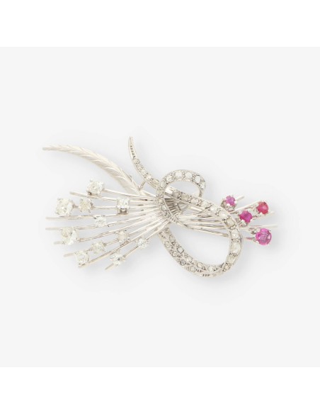 Broche oro blanco y bri