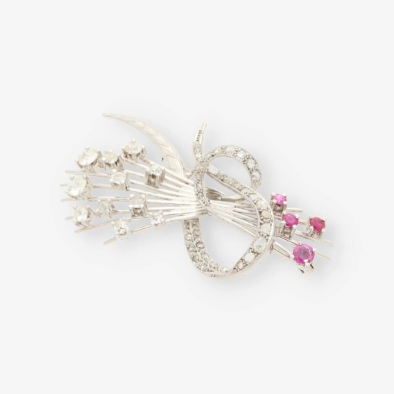 Broche oro blanco y bri